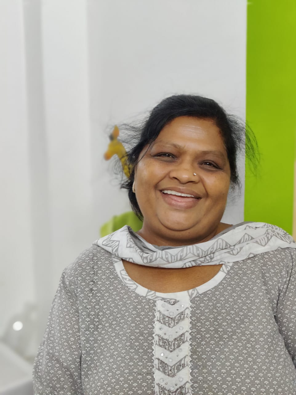 Sarika Garg smiling after dental implant at Bite Dental Clinic