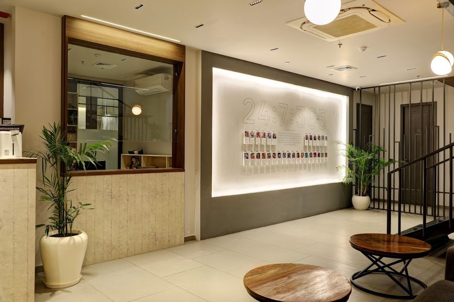 Bite Dental Gurugram clinic reception with 24:7:365 wall